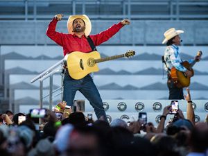 (Isaac Hale | Special to The Tribune) Garth Brooks performs with his band during a stop on their stadium tour held at Rice-Eccles Stadium in Salt Lake City on Saturday, July 17, 2021. Brooks is set to return to Rice-Eccles on June 18, 2022.
