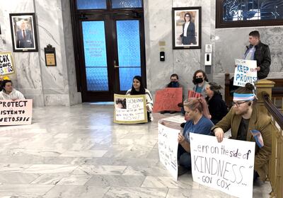 LGBTQ rights activists stage a demonstration outside Utah Gov. Spencer Cox's office. (Ben Winslow|FOX 13 News)
