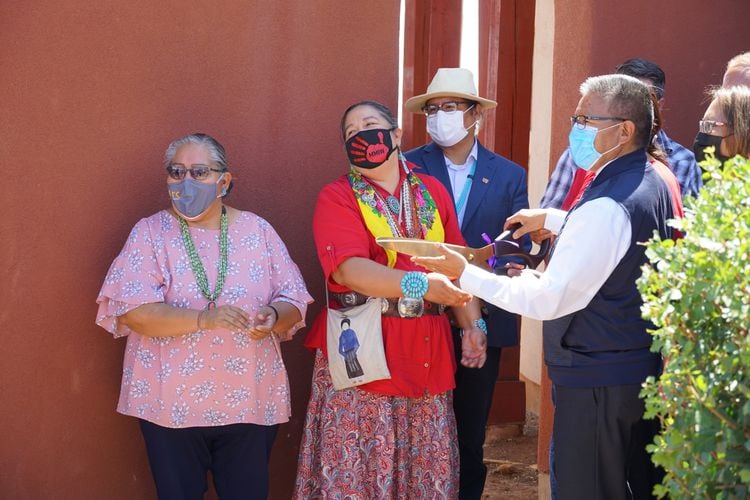 (Zak Podmore | The Salt Lake Tribune) Utah Navajo Health System board member Gloria Begaye (left), Navajo Nation Council Delegate Amber Kanazbah Crotty and Navajo Nation Vice President Myron Lizer cut the ribbon at the opening of the Gentle Ironhawk Shelter in Blanding on Wednesday, July 14, 2021.