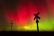 (Scott McClurg | The Lawrence Journal-World via AP) In this Nov. 8, 2004, file photo, the aurora borealis lights up the sky northwest of Lawrence, Kan. The phenomenon, also called northern lights, occurs when electrically charged particles from the sun enter the earth's atmosphere.