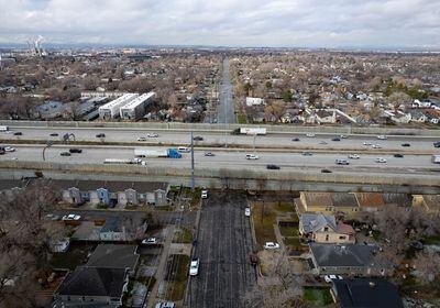 (Francisco Kjolseth | The Salt Lake Tribune) Interstate 15 divides neighborhoods at 400 North in Salt Lake City, Thursday, Feb. 9, 2024. City officials are crafting a plan to better connect the east and west sides of Utah's capital.