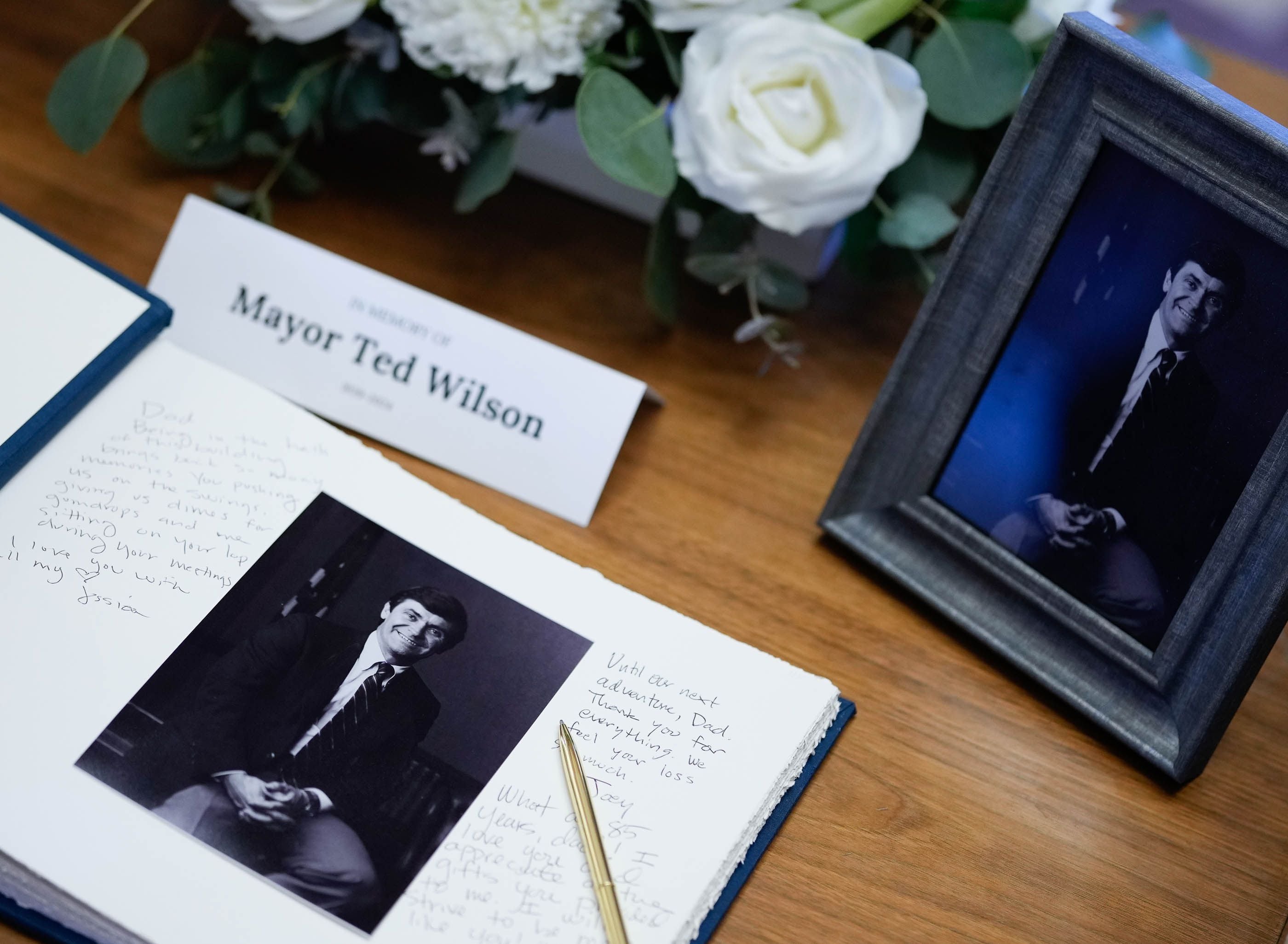 (Francisco Kjolseth | The Salt Lake Tribune) A memory book filled messages on the original desk used by former Salt Lake City Mayor Ted Wilson at Salt Lake City Hall on Monday, April 15, 2024.