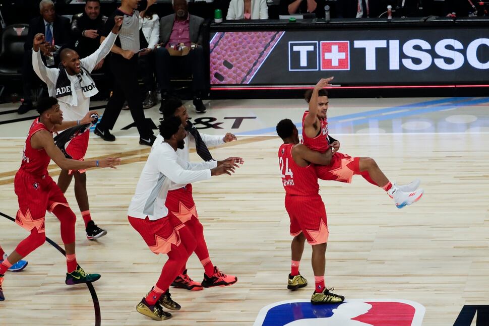 Trae Young of the Atlanta Hawks celebrates after makingf a three-point basket during the first half of the NBA All-Star basketball game Sunday, Feb. 16, 2020, in Chicago. (AP Photo/David Banks)
