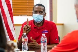 (Rick Egan  |  Tribune file photo) This Sept. 23, 2020, file photo shows Republican  Burgess Owens meeting with local manufacturers at Colonial Flag during the campaign for Utah's 4th Congressional District.