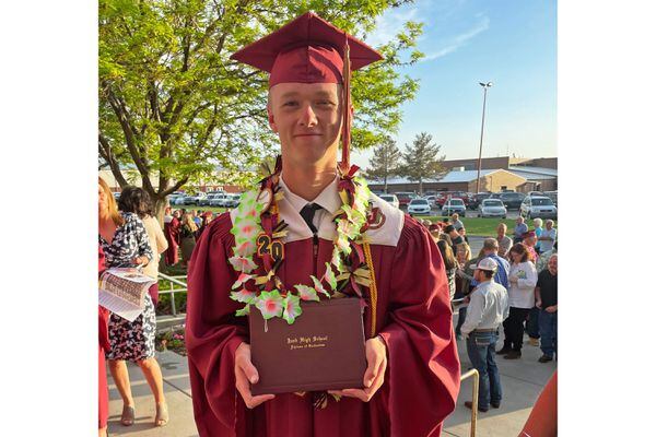 (Payton Park | Courtesy Photo) Following his graduation ceremony on May 24, 2023, Payton Park, 19, stands with his diploma from Juab High School. He has earned 37 college credits through the state's concurrent enrollment program.