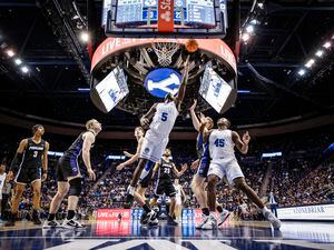 (BYU Athletics) BYU forward Gideon George goes up for a layup during a game against the Portland Pilots on Dec. 31, 2022, at the Marriott Center.