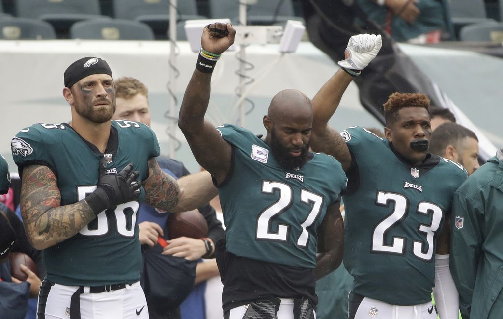 During an NFL season of protests and criticism, Chris Long asked, 'Why not  help?'