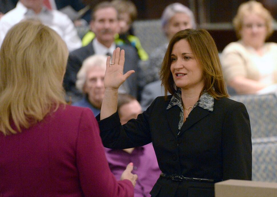 Al Hartmann | The Salt Lake Tribune Oath of office is administered to incoming Salt Lake County council member, Jenny Wilson at the Salt Lake County Council chamber Monday January 5. 
