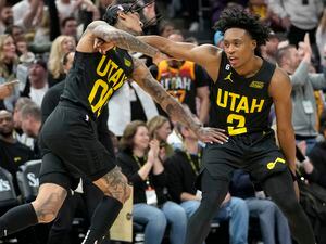 (Leah Hogsten | The Salt Lake Tribune)  Utah Jazz guard Jordan Clarkson (00) and Utah Jazz guard Collin Sexton (2) celebrate Clarkson's 3-pointer as the Utah Jazz host the Dallas Mavericks, Jan. 28, 2023 at Vivint Arena. 