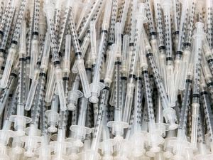 (Rick Egan | The Salt Lake Tribune) Syringes for Utah County residents to receive COVID-19 vaccinations in Spanish Fork on Wednesday, Jan. 27, 2021. Twenty-eight more Utahns have died from the coronavirus in the past week, state health officials reported.