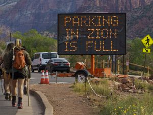 (Leah Hogsten | The Salt Lake Tribune)  Zion National Park, seen in September 2021, could close its entrance gates during the Memorial Day Weekend, when it sees more visitors in three days than some national parks see during an entire year.