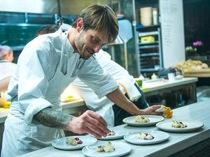(Chris Detrick  |  Tribune file photo) Nick Fahs — seen here preparing plates for Table X in 2017 — is now working with the restaurant's wholesale bakery business.