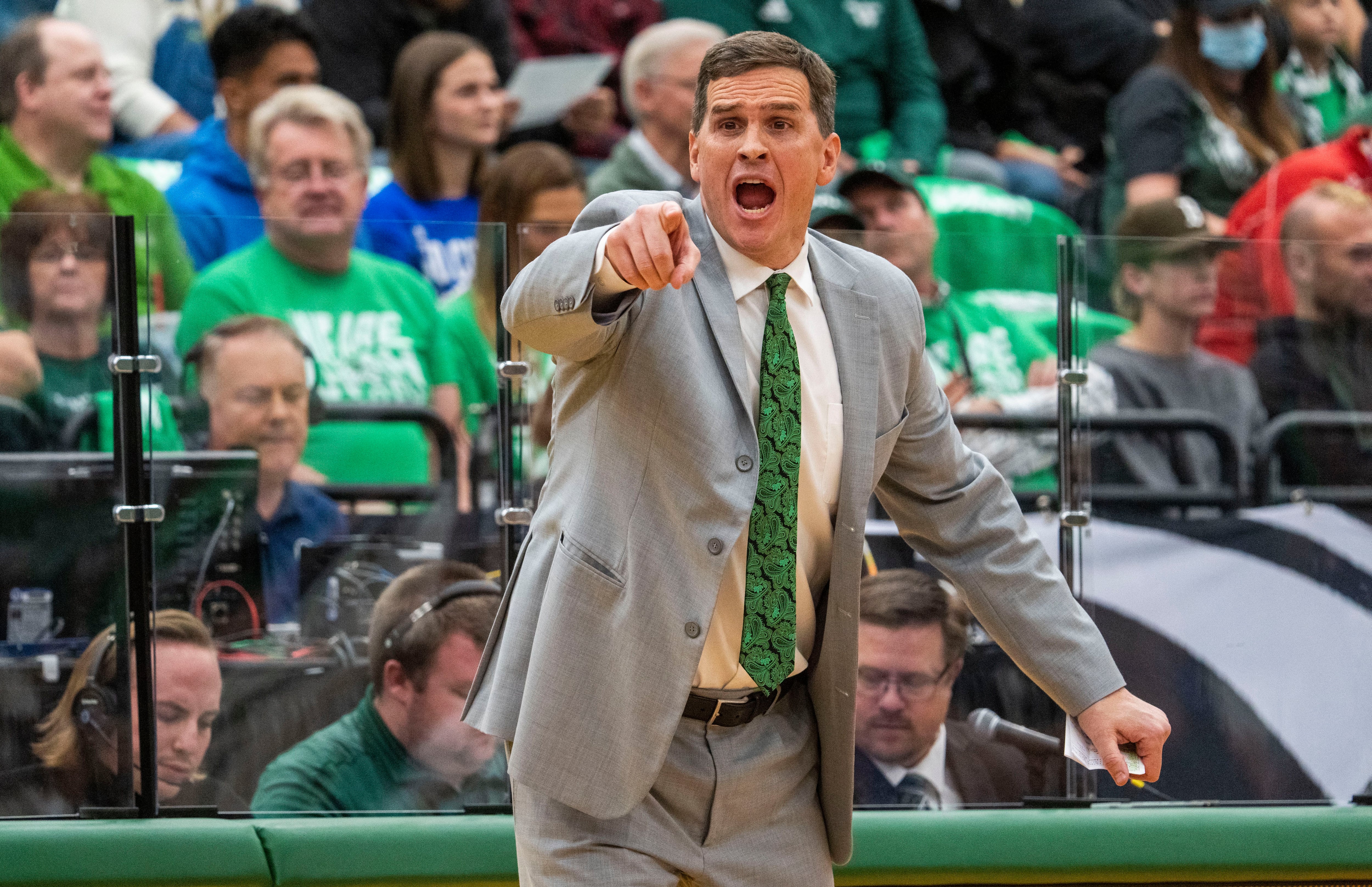 (Rick Egan | The Salt Lake Tribune) Utah Valley Wolverines head coach Mark Madsen shouts directions to his team, in basketball action, between the Brigham Young Cougars and the Utah Valley Wolverines in Orem, on Wednesday, Dec. 1, 2021.