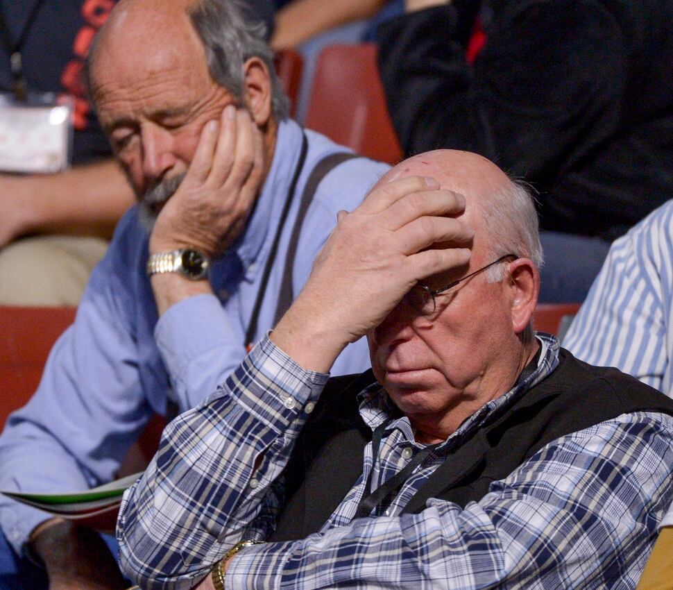 (Leah Hogsten | The Salt Lake Tribune) l-r Frustrations and weariness show on the faces of delegates as the convention drags on due to rigorous debate on bylaws, amendment proposals and rules at the Utah Republican Nominating Convention Saturday, April 21, 2018 at the Maverik Center. 