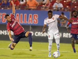 (LM Otero | AP) Real Salt Lake midfielder Anderson Julio (29) makes a run on the goal as FC Dallas defender Matt Hedges (24) comes in during the second half of an MLS soccer match Saturday, Aug. 27, 2022, in Frisco, Texas.
