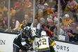 (Leah Hogsten | The Salt Lake Tribune) Fans try to get photos of a scrum as the Los Angeles Kings and Vegas Knights meet in a preseason game in Salt Lake City on Sept. 30, 2021.