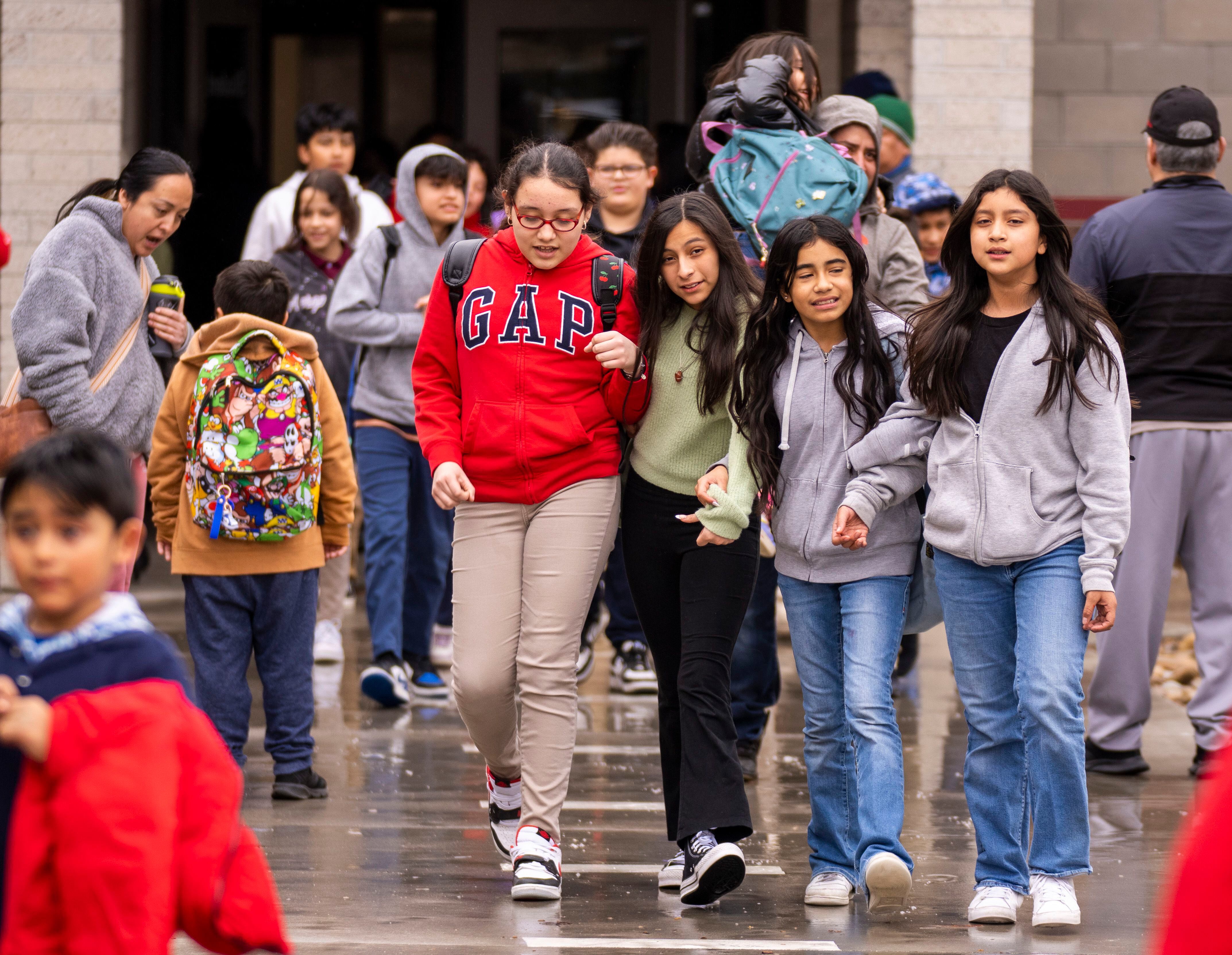 (Rick Egan | The Salt Lake Tribune)  
Students head for home, at Guadalupe School, on Thursday, March 7, 2024.
