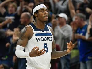 Minnesota Timberwolves forward Jarred Vanderbilt in action against Memphis Grizzlies during the first half in Game 4 of an NBA basketball first-round playoff series Saturday, April 23, 2022, in Minneapolis. The Timberwolves win 119-118. (AP Photo/Craig Lassig)