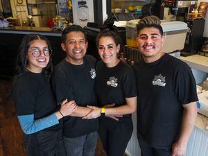 (Leah Hogsten | The Salt Lake Tribune) Melvin and Mayra Zelaya, center, have operated their Syracuse restaurant Waffle Stop and Authentic Salvadorean Cafe since 2019 with the help of their daughter Fabiola, 18, and son Leonidas, 23. Waffle Stop and Authentic Salvadorean Cafe serves Salvadoran fusion cuisine, including pupusas, waffles and tacos, March 29, 2023.