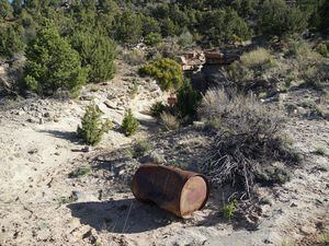 (Zak Podmore | The Salt Lake Tribune) Trash outside the abandoned None Such uranium mine in San Juan County, June 14, 2021. Radon occurs naturally in the presence of radioactive elements, such as uranium and radium.