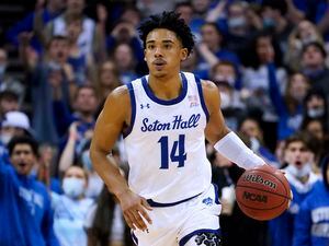 Seton Hall's Jared Rhoden brings the ball up during the second half of the team's NCAA college basketball game against Xavier, Wednesday, Feb. 9, 2022, in Newark, N.J. (AP Photo/John Minchillo)