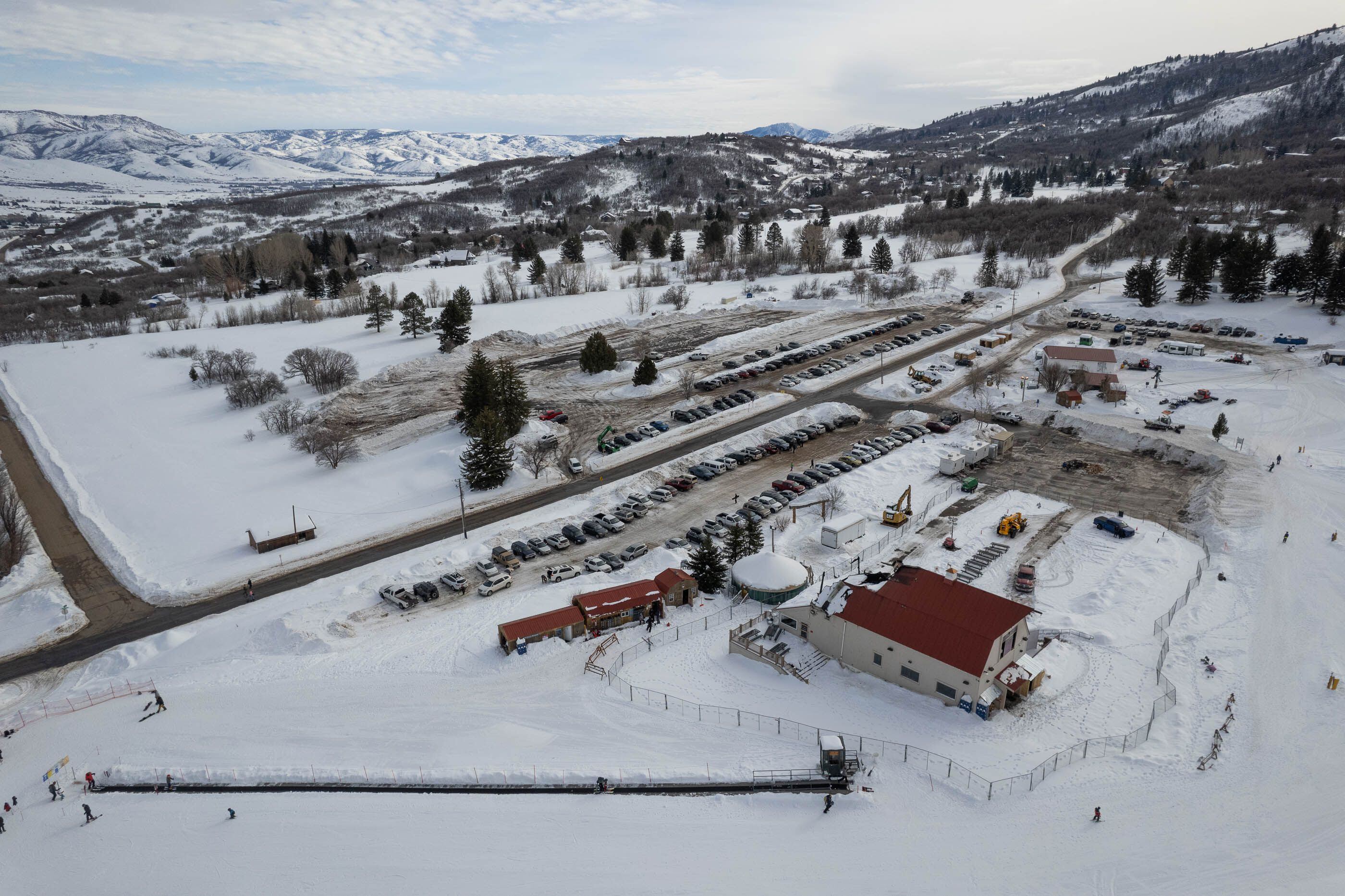 (Francisco Kjolseth | The Salt Lake Tribune) A fire that broke out on Monday, Jan. 15, inside the historic lodge at Nordic Valley Ski Resort in Weber County is pictured on Friday, Jan. 19, 2024. Water and fire damage might render the barn built in the 1920’s a total loss. 