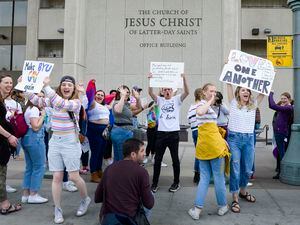 (Leah Hogsten  |  The Salt Lake Tribune)  Brigham Young University LGBTQ students rally outside The Church of Jesus Christ of Latter-day Saints office building, Mar. 6, 2020.