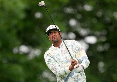 Tony Finau watches his tee shot on the 17th hole during the third round of the PGA Championship golf tournament at Southern Hills Country Club, Saturday, May 21, 2022, in Tulsa, Okla. (AP Photo/Matt York)