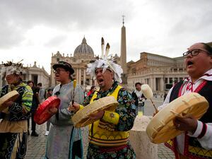 (AP Photo/Alessandra Tarantino) Members of the Assembly of First Nations perform in St. Peter's Square at the Vatican, Thursday, March 31, 2022. Pope Francis has welcomed First Nations delegations to the Vatican. They are seeking an apology for the Catholic Church's role in running Canada's notorious residential schools for Indigenous children.