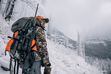 (Chris Gill | MeatEater) Steven Rinella hunts for mountain goat in Montana snow in 2020 for a Season 10 episode of his Netflix hunting and cooking show "MeatEater."