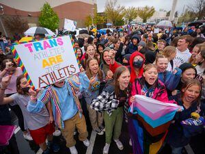 (Trent Nelson  |  The Salt Lake Tribune) Clayton Middle School students chant "Let them play!" during a walkout protesting HB 11, which bans transgender students from competing in sports, in Salt Lake City on Friday, April 22, 2022.