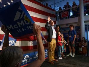 (Leah Hogsten | The Salt Lake Tribune) Evan McMullin, the Independent party candidate for the 2022 U.S. Senate thanks supporters with his family at a rally, Sept. 7, 2022. McMullin, who is hoping to unseat incumbent Mike Lee, addressed a crowd of about 200 people in Salt Lake City.