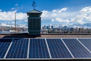 (Trent Nelson  |  The Salt Lake Tribune) Solar panels on the roof of Century Laundry in Salt Lake City on Thursday, March 10, 2022. A new effort is underway to bring more such panels to west-side businesses.