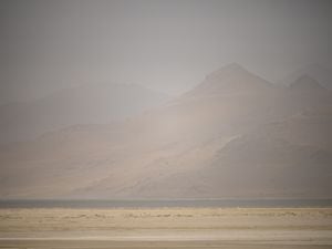 (Trent Nelson  |  The Salt Lake Tribune) Dust obscures Antelope Island and the Great Salt Lake on Saturday, June 18, 2022.