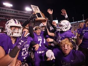 (Trent Nelson  |  The Salt Lake Tribune) Lehi players celebrate the win over Timpview in the 5A high school football championship game at Rice-Eccles Stadium in Salt Lake City on Friday, Nov. 18, 2022.