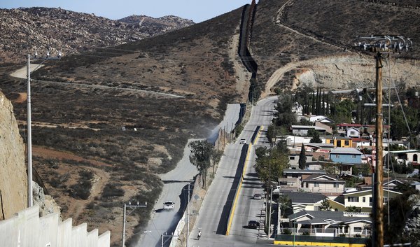 Trump seeks $18 billion to extend border wall over 10 years