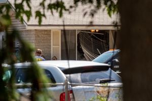 (Chris Samuels | The Salt Lake Tribune) Authorities investigate a home in Provo on Wednesday, Aug. 9, 2023. The FBI shot and killed a man who authorities say made threats to President Joe Biden ahead of his visit to Utah on Wednesday.