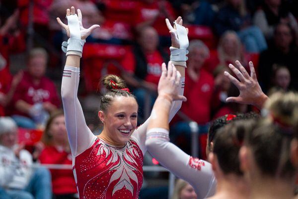 (Trent Nelson  |  The Salt Lake Tribune) Ella Zirbes on bars as Utah hosts Arizona State, NCAA gymnastics at the Huntsman Center in Salt Lake City on Friday, Jan. 26, 2024.