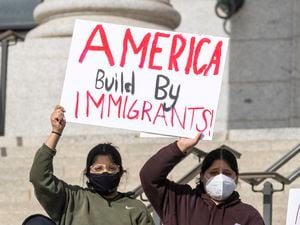 (Rick Egan | The Salt Lake Tribune)  Participants gather on the steps of the Capitol, for the national Day Without Immigrants rally, on Monday, Feb. 14, 2022. In an op-ed published in The Washington Post on Tuesday, Gov. Spencer Cox wrote that he supports a proposal that would allow states to sponsor immigrants.