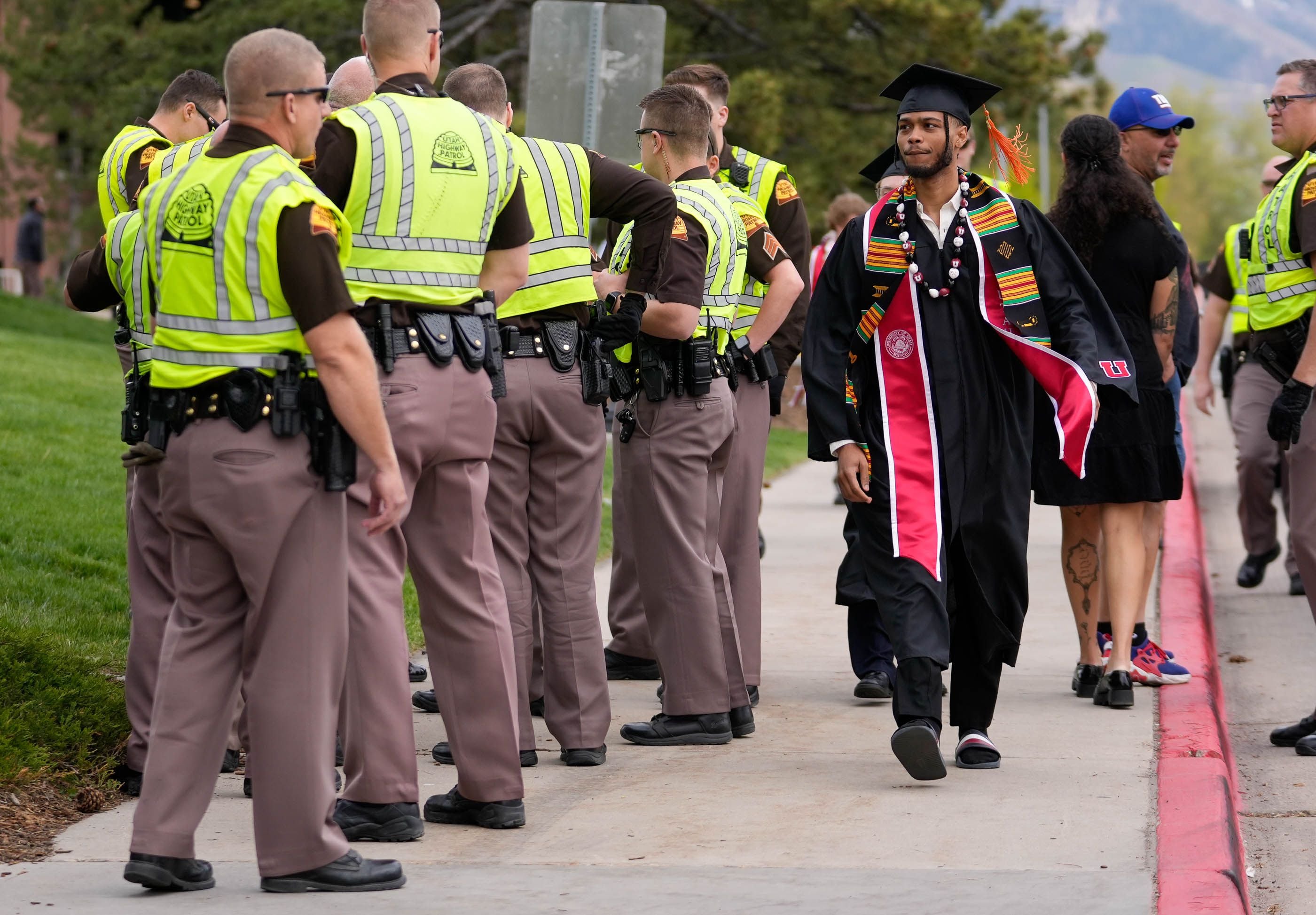 (Francisco Kjolseth  |  The Salt Lake Tribune) Heavy police presence surrounds the Huntsman Center on the University of Utah campus for commencement ceremonies as demonstrators gather nearby in support of Palestine on Thursday, May 2, 2024.
