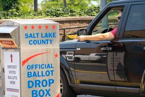 (Rick Egan | The Salt Lake Tribune) A voter drops his ballot in the drop box at Murray City Hall, on Tuesday, Aug. 10, 2021.