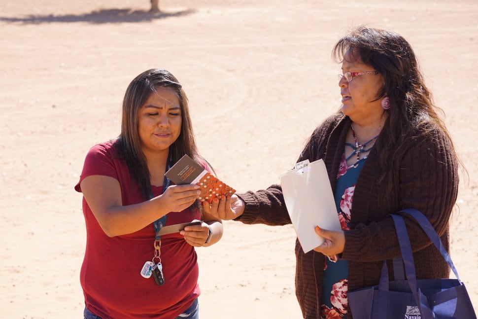 (Zak Podmore | The Salt Lake Tribune) Dalene Redhorse hands information on Plus Codes to her niece, Menvalia Redhorse, on Oct. 10, 2019.
