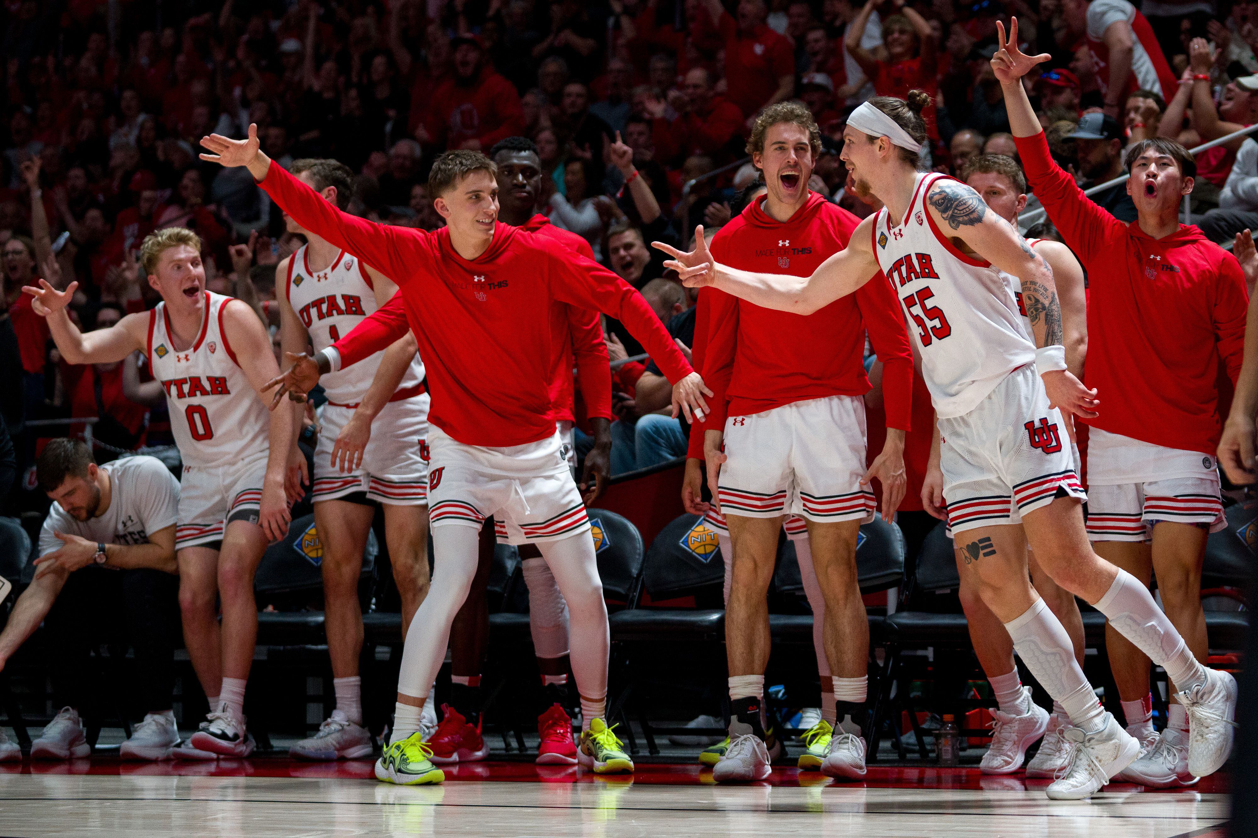 (Trent Nelson  |  The Salt Lake Tribune) Utah Utes guard Gabe Madsen (55) celebrates a three-pointer as Utah hosts Virginia Commonwealth in the NIT quarterfinals, NCAA basketball in Salt Lake City on Wednesday, March 27, 2024.