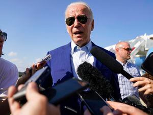 (AP Photo/Evan Vucci, File) President Joe Biden speaks to members of the media after exiting Air Force One, Wednesday, July 20, 2022, at Andrews Air Force Base, Md. Utah Rep. Burgess Owens joined more than 50 House Republicans who called on Biden to undergo a cognitive screening.