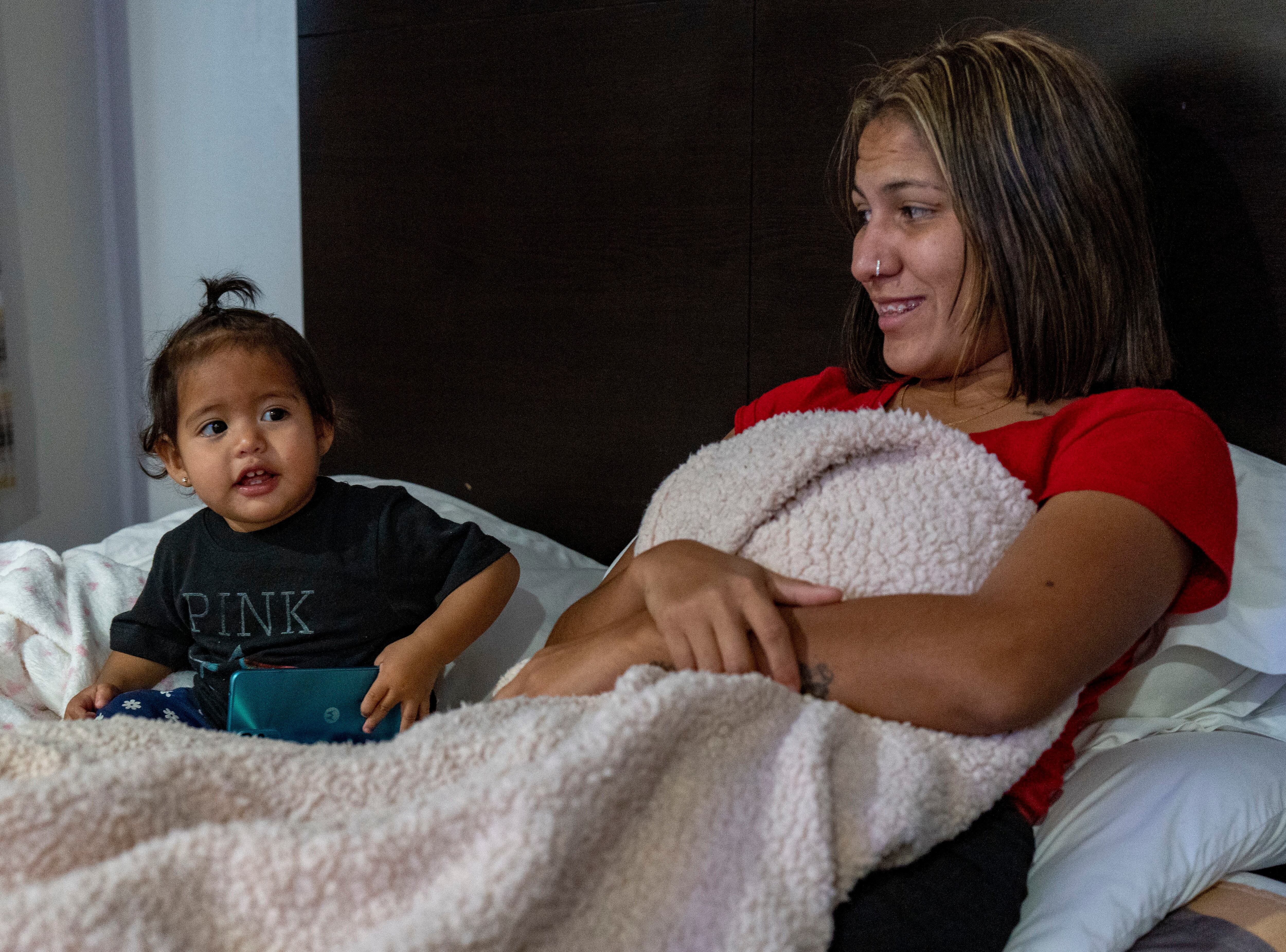 (Rick Egan | The Salt Lake Tribune) One-year-old Aranza with her mother, Yurjanys Leal Escudero, in a Salt Lake City motel room on Tuesday, Feb. 13, 2024.