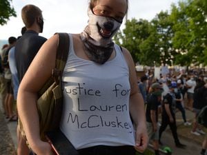 (Leah Hogsten  |  The Salt Lake Tribune)  A woman asks for justice for Lauren McCluskey during a protest on Monday, June 1, 2020.