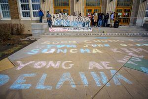 (Trent Nelson  |  The Salt Lake Tribune) The names of victims in the recent Atlanta shootings are written in chalk at Salt Lake Community College during a Peace & Justice Vigil on Friday, March 19, 2021.