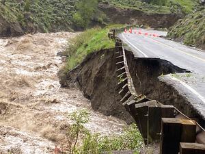 (National Park Service via AP) High water in the Gardiner River along the North Entrance to Yellowstone National Park in Montana washed out part of a road on Monday, June 13, 2022.