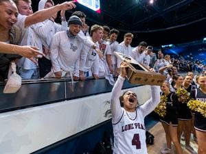 (Rick Egan | The Salt Lake Tribune) Lone Peak guard, Makeili Ika (4), celebrates their 67-65 double-overtime win over Fremont, in the 6A State Championship game, at the Marriott Center in Provo, on Saturday, March 5, 2022.  Ika hit the winning shot with .5 seconds left on the clock. 