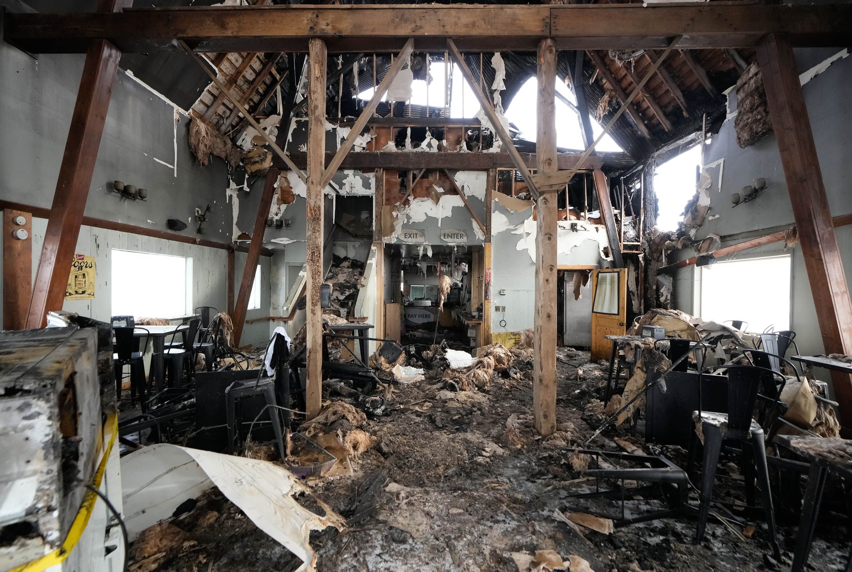 (Francisco Kjolseth | The Salt Lake Tribune) Extensive fire damage to the lodge at Nordic Valley Ski Resort in Weber County is pictured on Friday, Jan. 19, 2024. The fire that broke out earlier in the week might render the historic building that housed the restaurant, ticket office and business offices a total loss. 